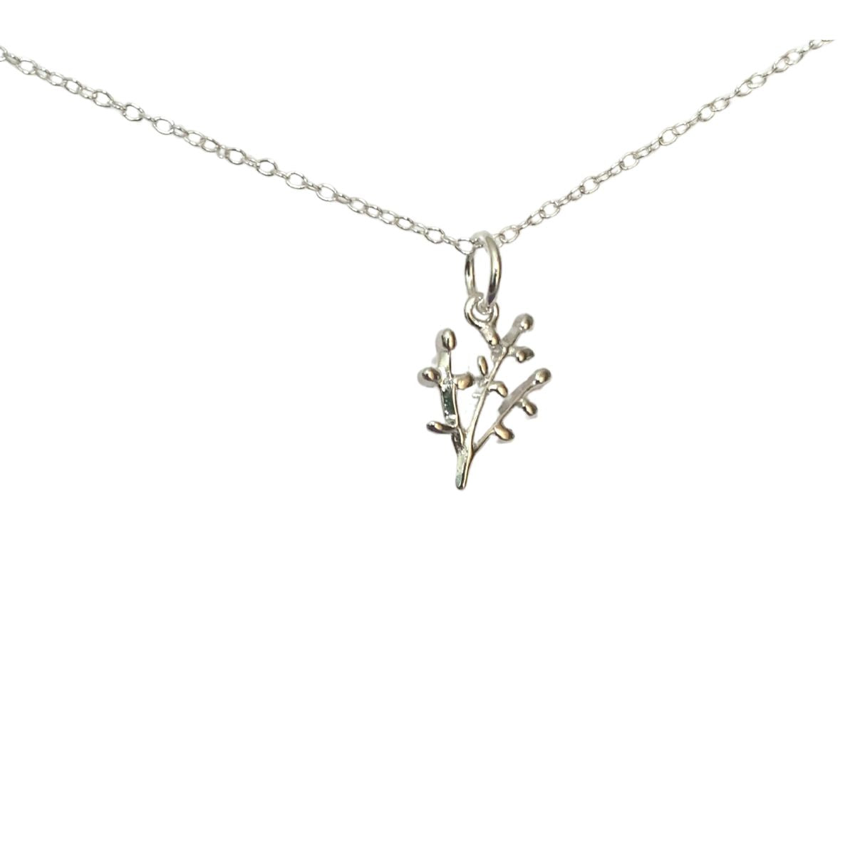 sterling silver chain with a sprig of Scottish Heather as the pendant.