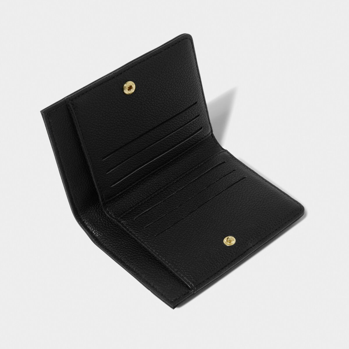 open purse showing six card slots, a section for cash notes and gold popper fastener