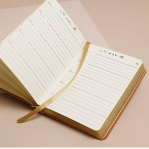 inside the undated five year, thought a day journal showing the month of May