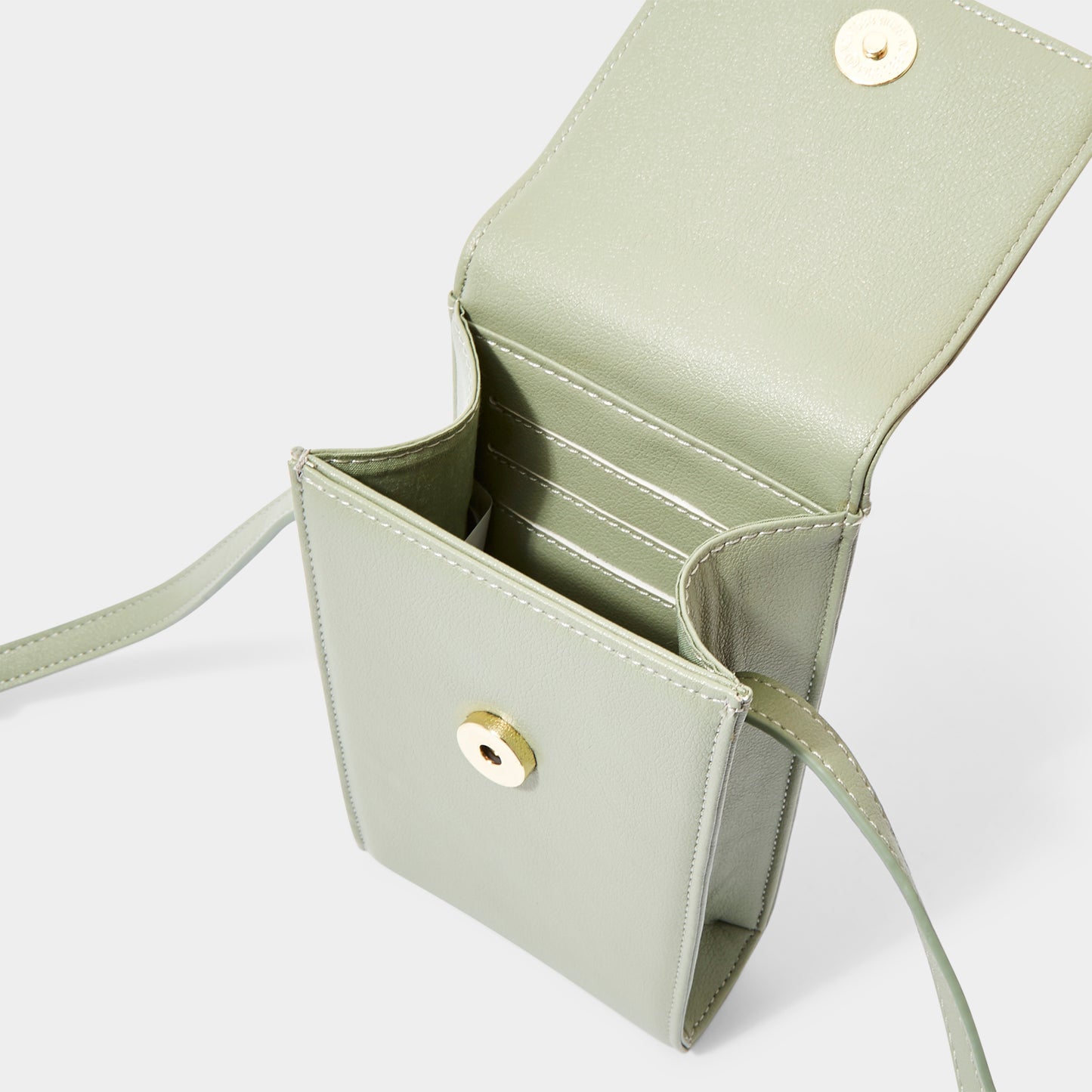 Taylor crossbody bag by Katie Loxton sage green inside
