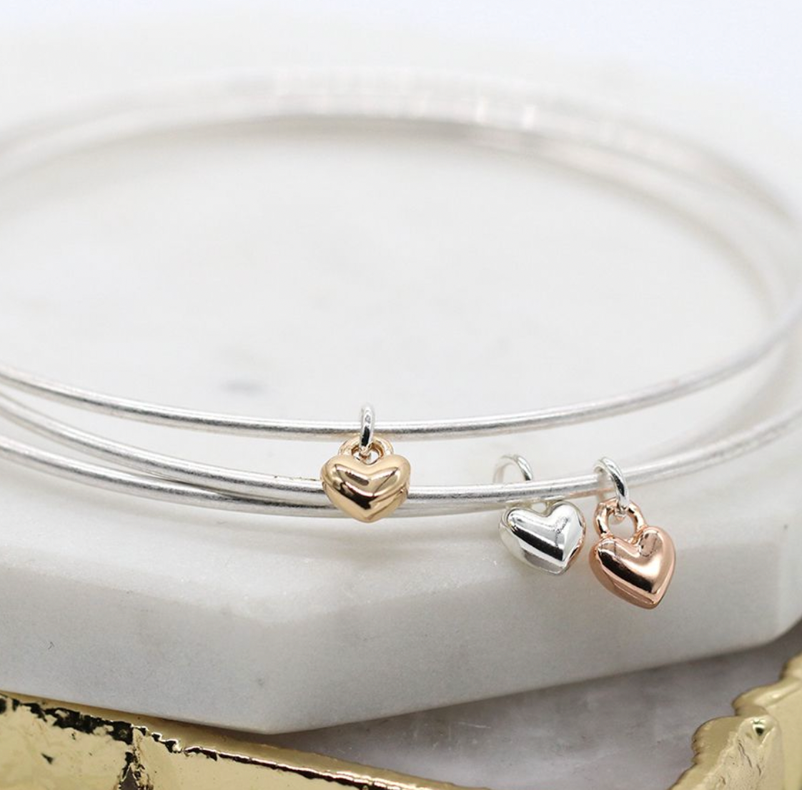 Silver plated triple fine bangle set with mixed metallic hearts