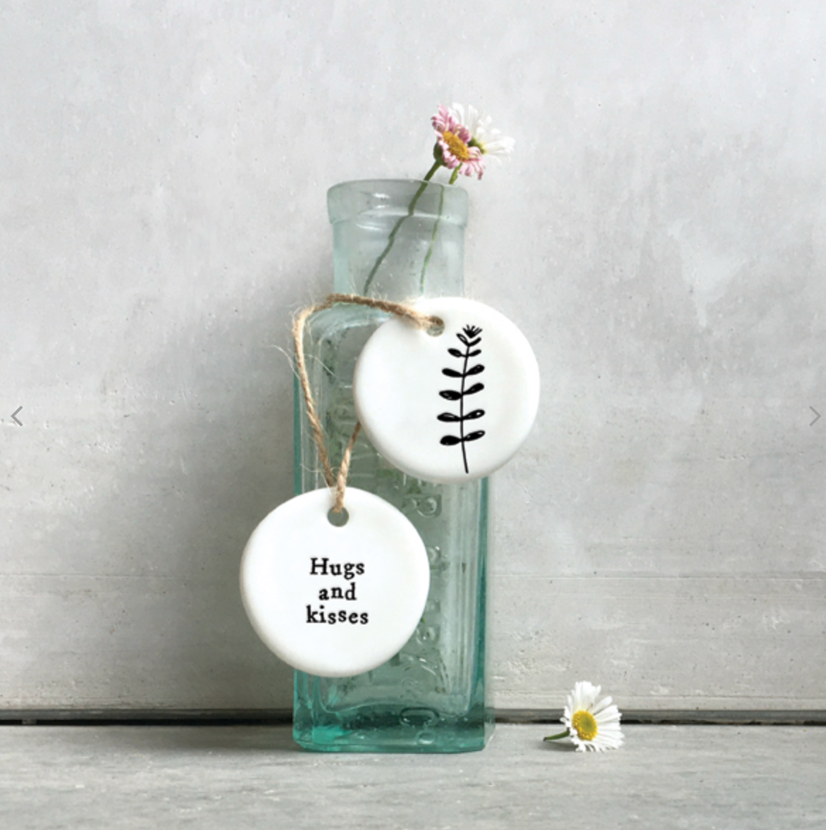 hugs and kisses white porcelain keepsake token used as a bottle tag