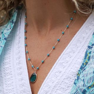 Golden turquoise bead necklace with teal crystal drop