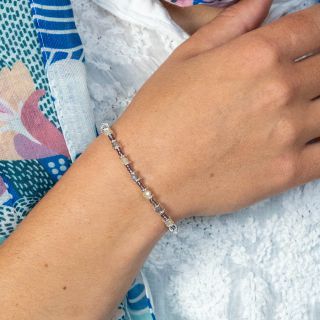 Mauve mix bead bracelet with silver plated spacer beads