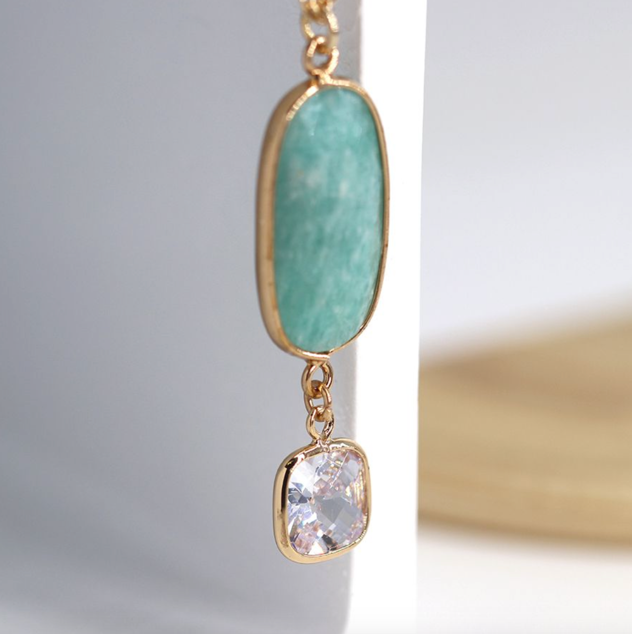 Aqua stone and crystal golden drop necklace