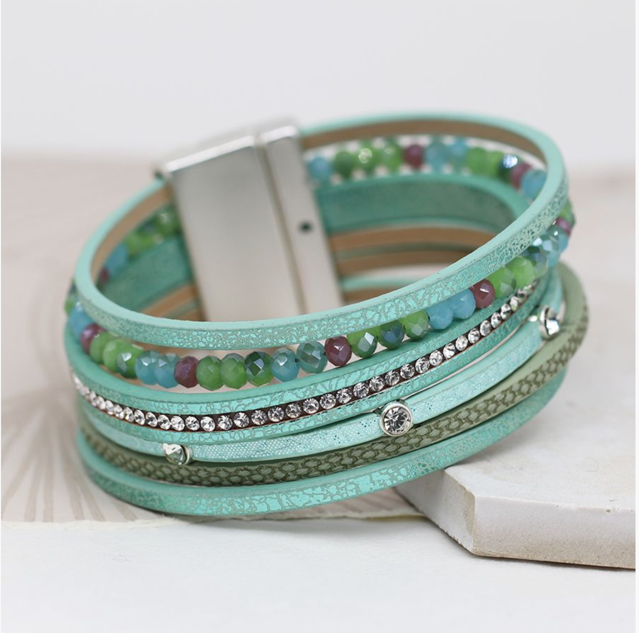 Aqua leather bracelet with mixed beads and crystals