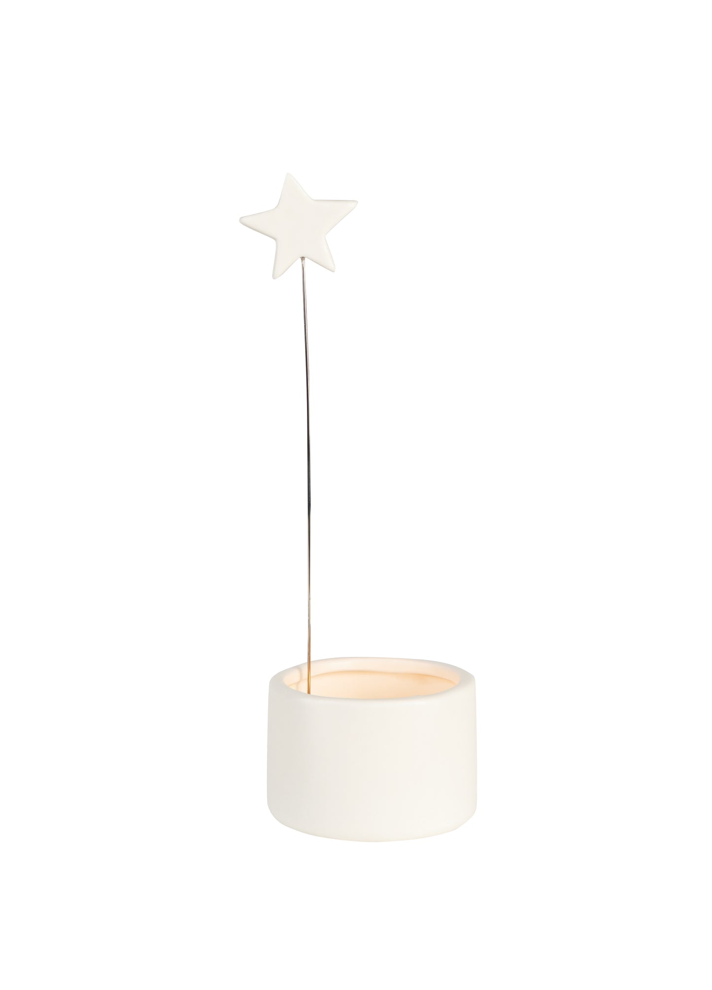 white porcelain tealight holder with suspended star motif