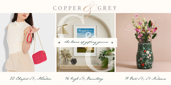 copper & grey gift shop banner featuring a handbag, a print of St Andrews and a floral vase