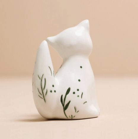 back view of ceramic fox ring holder with floral design