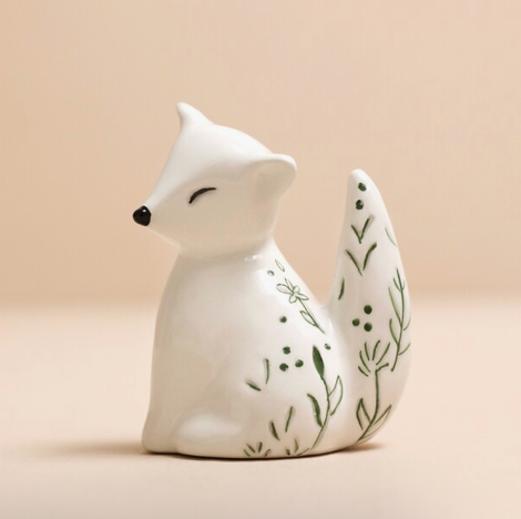 side view of ceramic fox ring holder with floral design