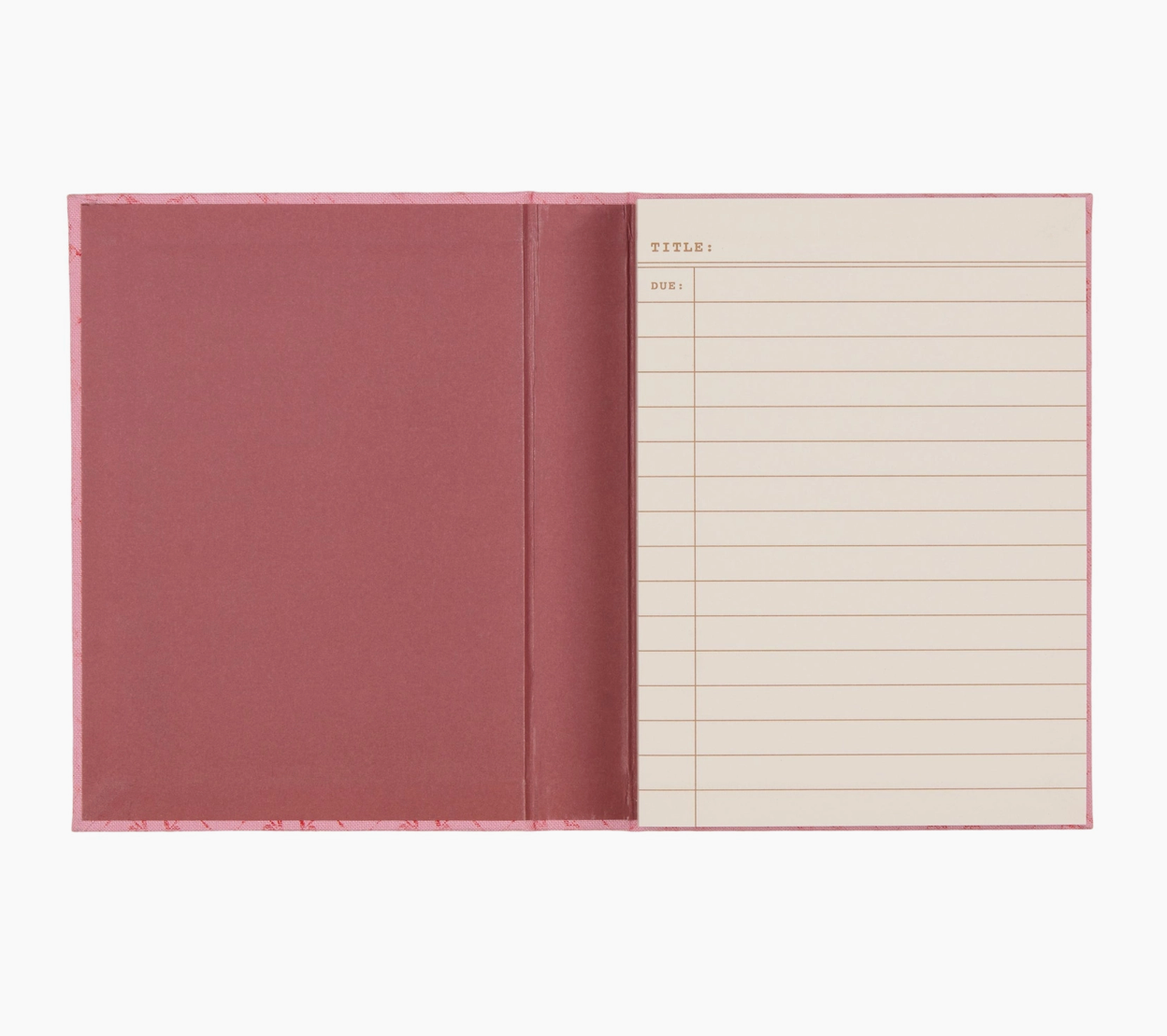 Inside of notebook showing blank inside cover (pink) and lined first page.