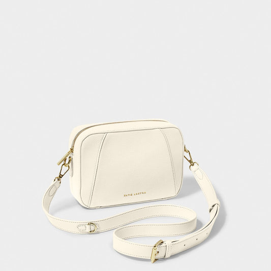 off-white crossbody bag against a white background