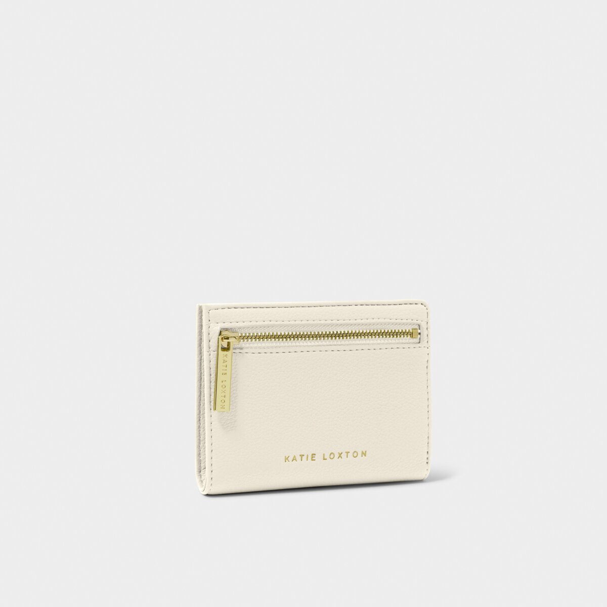small rectangular purse with a gold zipper. The purse has Katie Loxton in gold foil printed near the bottom edge.