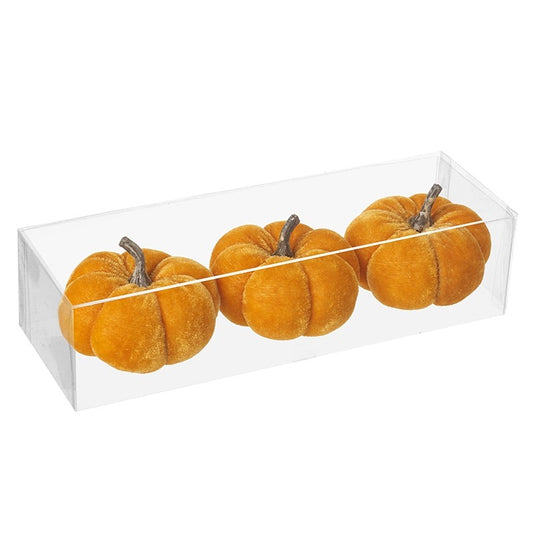clear box containing 3 orange velvet pumpkin decorations