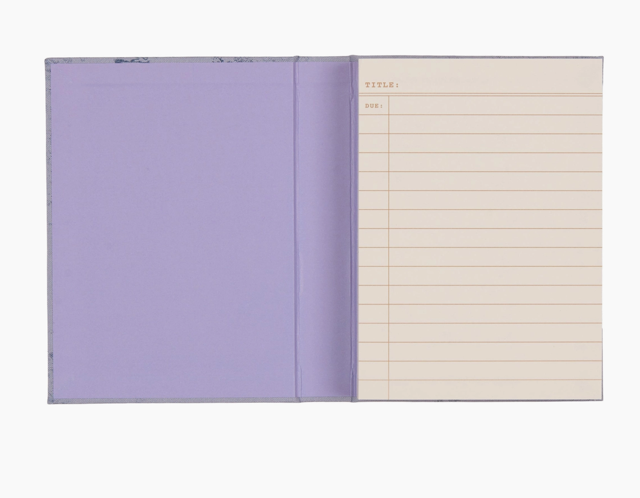 Inside of notebook showing the blank, purple inside cover and the first lined page for taking notes.