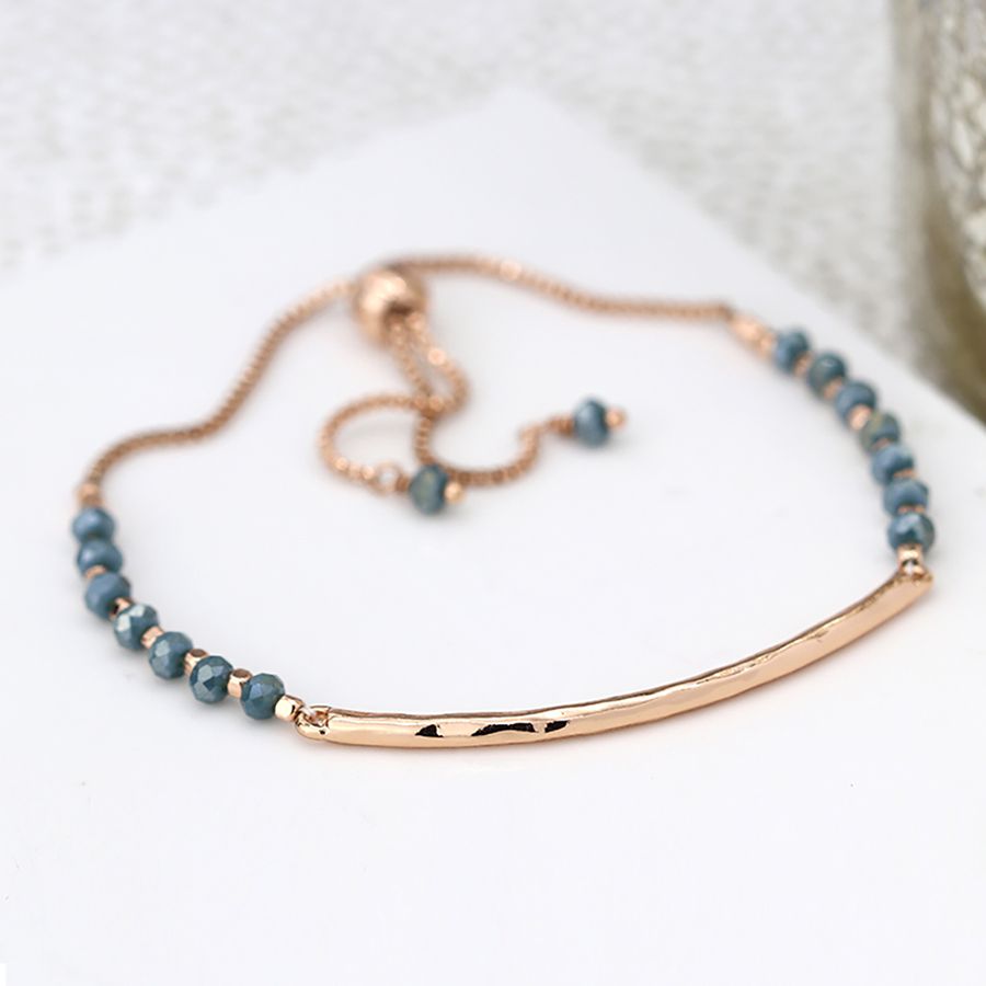 Adjustable bracelet with blue beads & rose gold bar