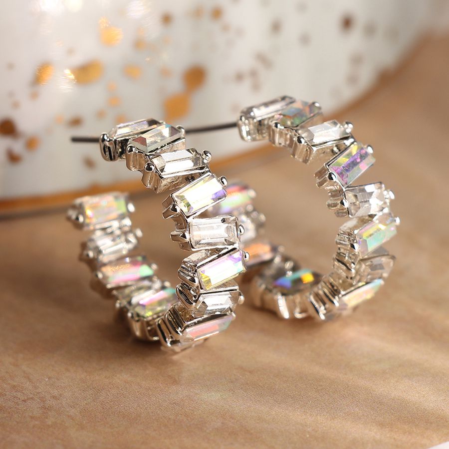 Silver plated staggered crystal hoop earrings