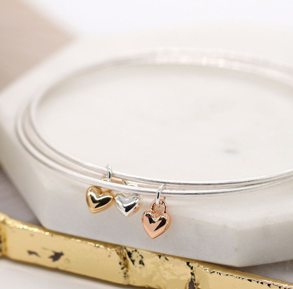 Silver plated triple fine bangle set with mixed metallic hearts