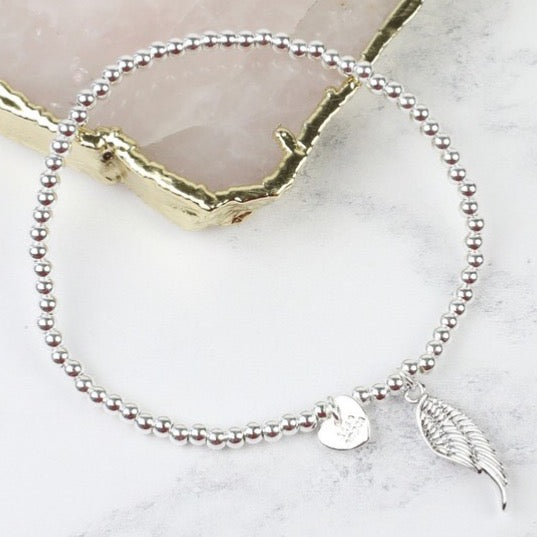Beaded Silver Bracelet with Angel Wing Charm