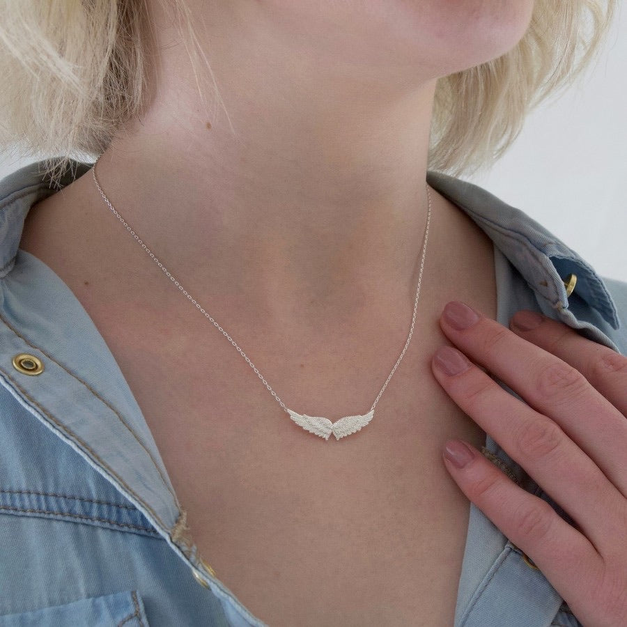 silver angel wing charm necklace