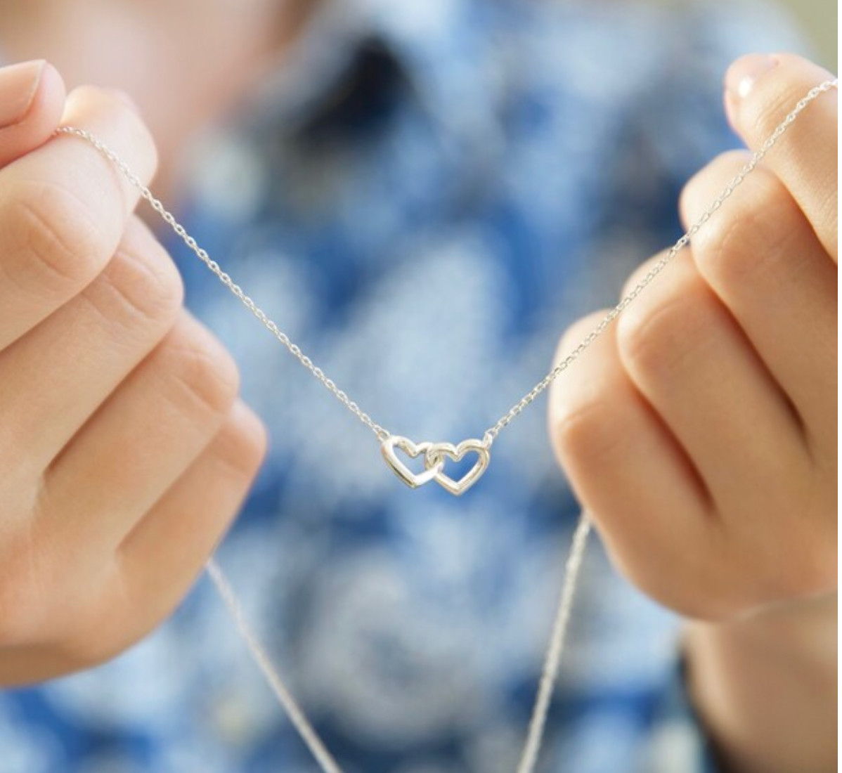 Interlocking hearts silver plated necklace