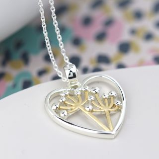 Silver plated heart necklace with golden floral centre