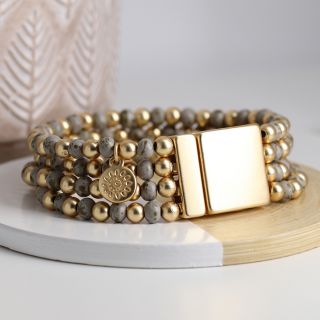 Golden and distressed grey bead multi strand bracelet